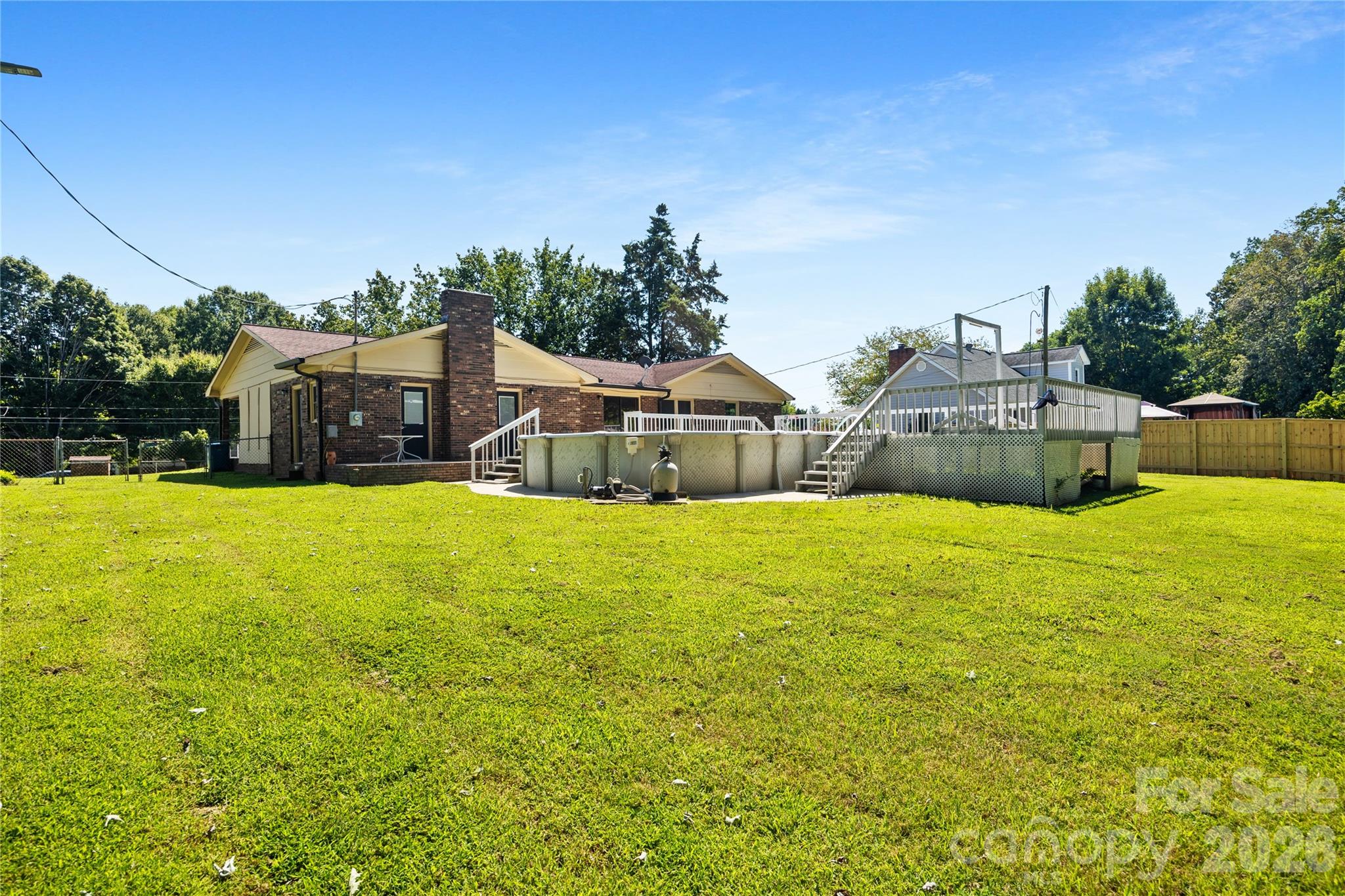 168 Mooreland Road Mooresville, NC 28117 - Photo 31 of 32 a view of a house with a swimming pool