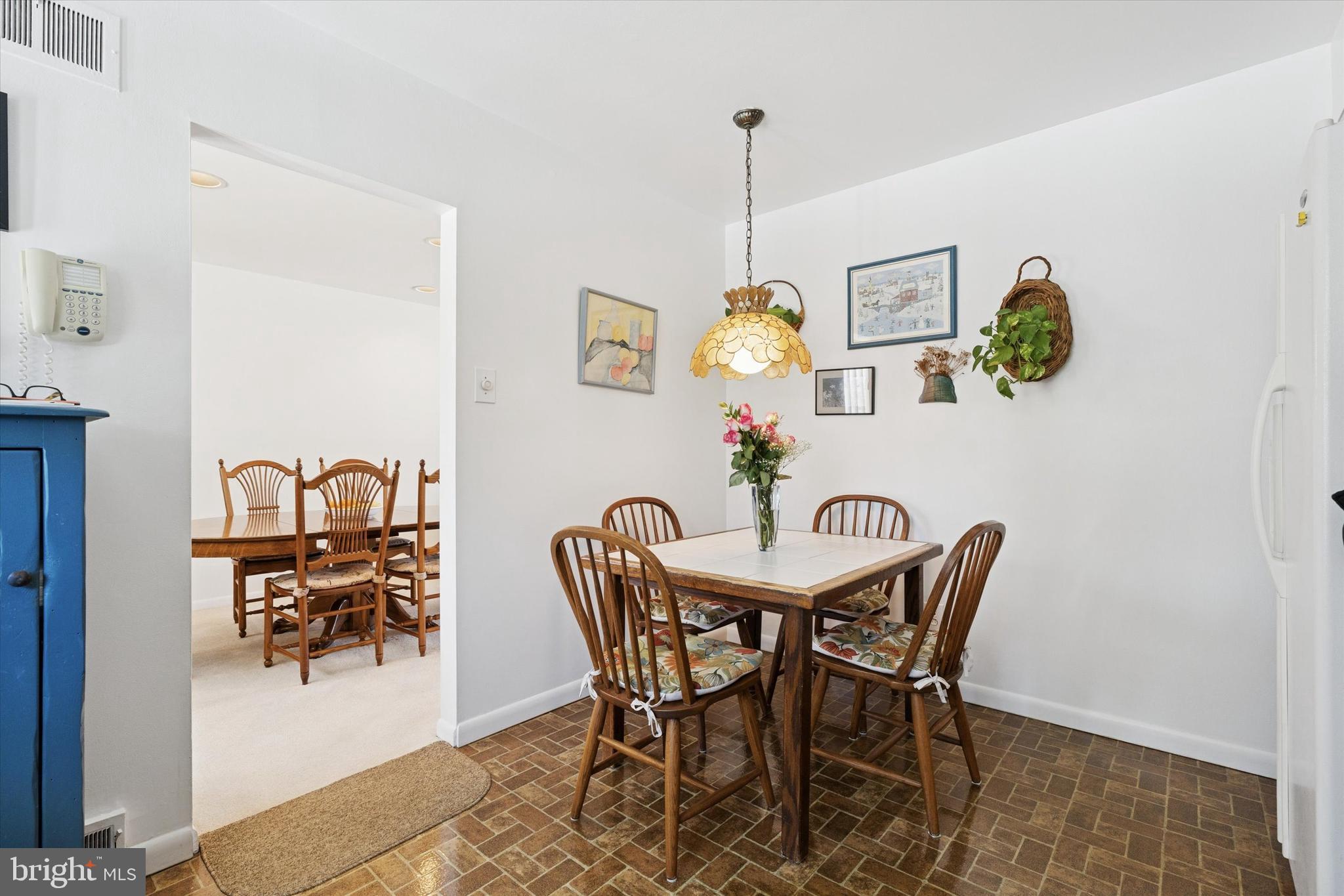 9204 Burbank Road Philadelphia, PA 19115 - Photo 11 of 43 a view of a dining room and livingroom furniture and wooden floor