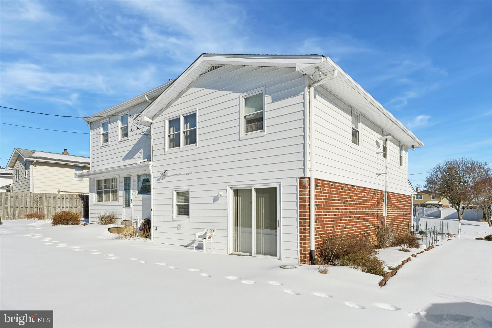 9204 Burbank Road Philadelphia, PA 19115 - Photo 24 of 43 a view of a house with a patio