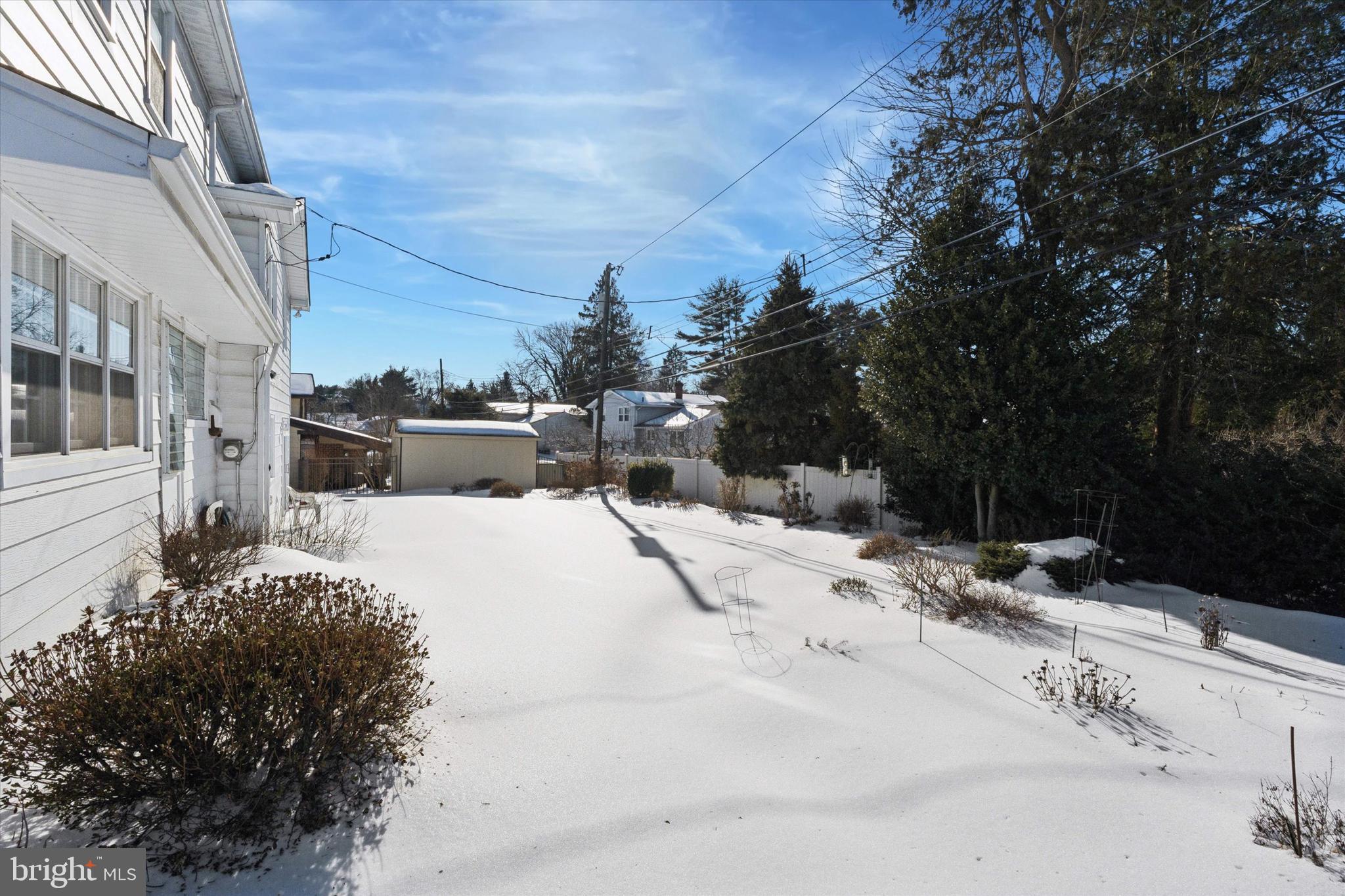 9204 Burbank Road Philadelphia, PA 19115 - Photo 25 of 43 a view of a backyard of the house