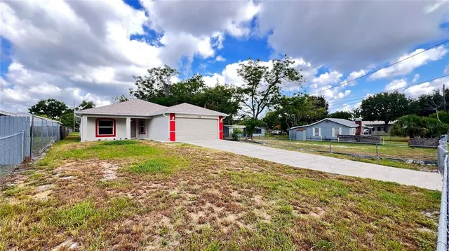 a front view of house with yard and entertaining space