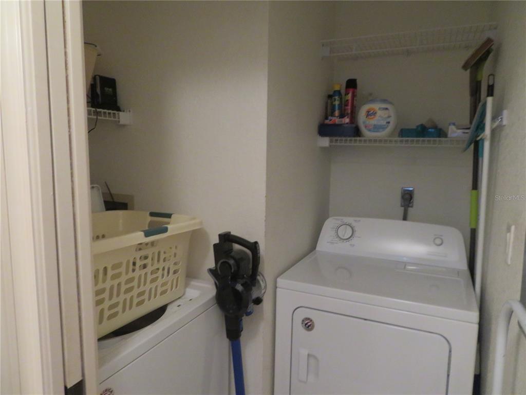 1360 Rio De Janeiro Avenue, Unit 117 Punta Gorda, FL 33983 - Photo 20 of 20 a utility room with dryer and washer