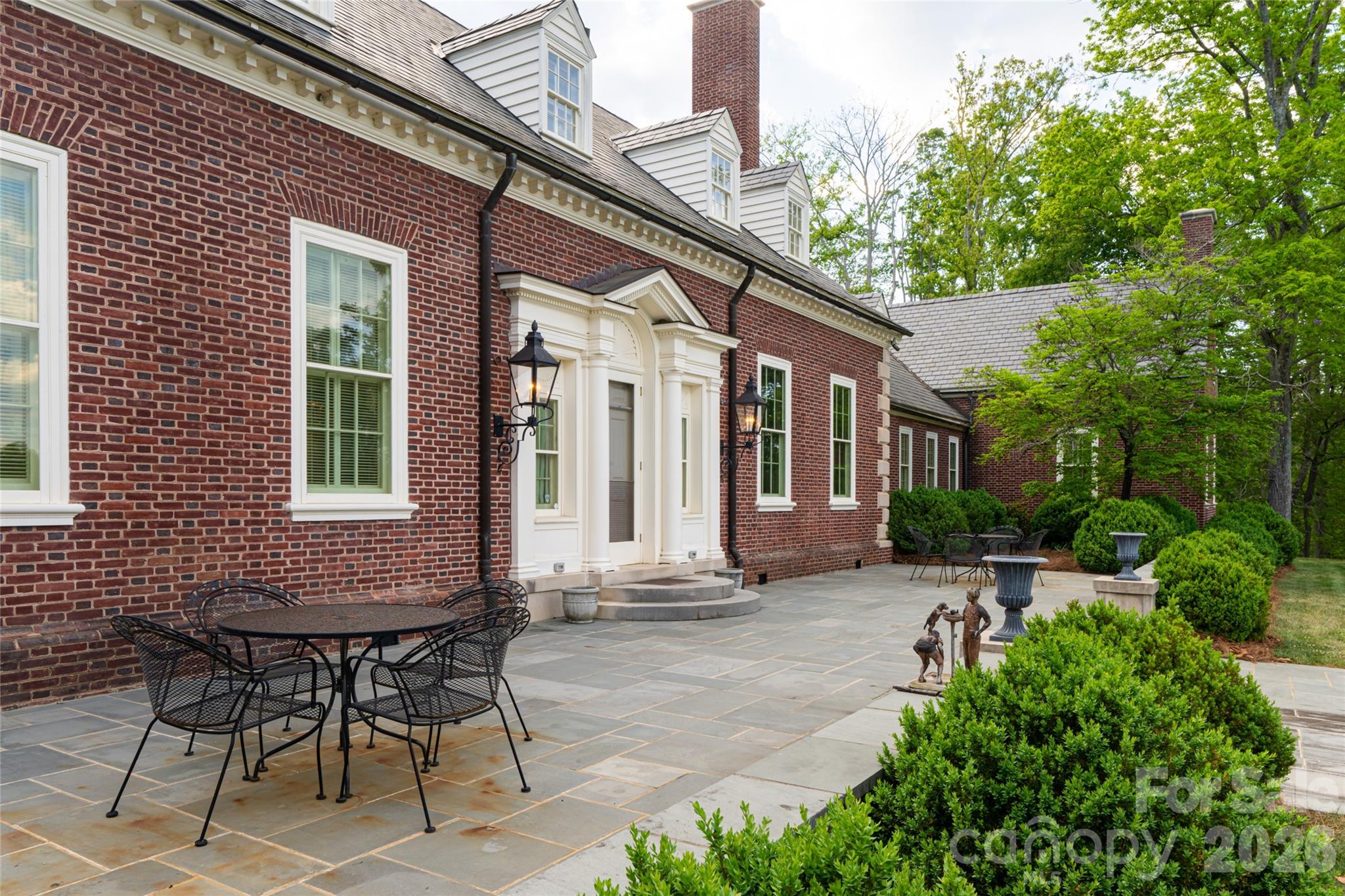 324 Vanderbilt Road Asheville, NC 28803 - Photo 29 of 48 a backyard of a house with outdoor seating