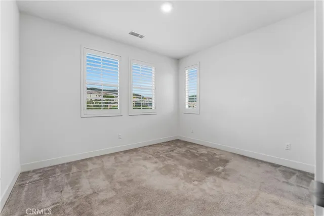 a bathroom with a double vanity sink and mirror