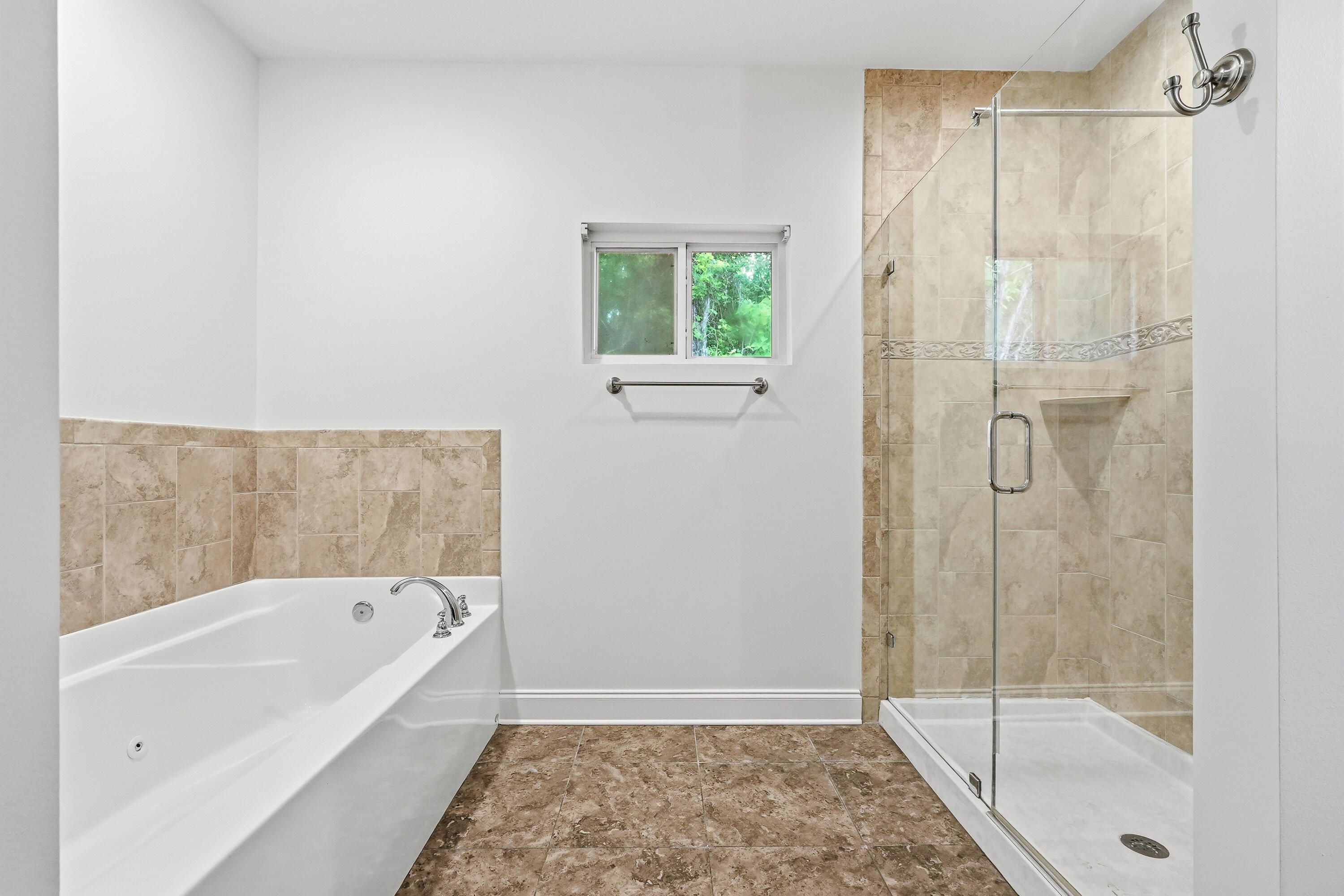 63 2nd Avenue Shalimar, FL 32579 - Photo 28 of 54 a bathroom with a bathtub and a shower