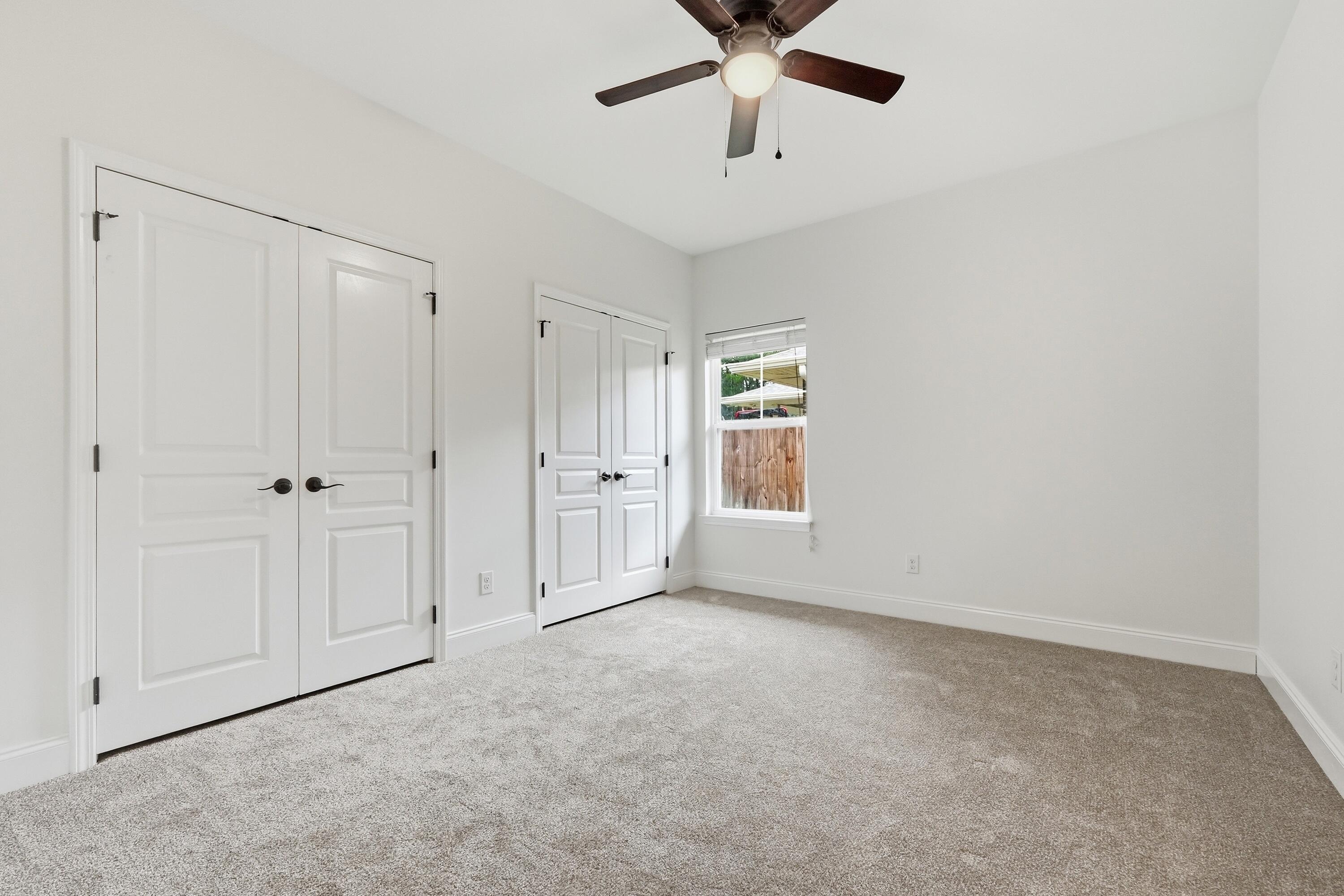 63 2nd Avenue Shalimar, FL 32579 - Photo 37 of 54 an empty room with fan