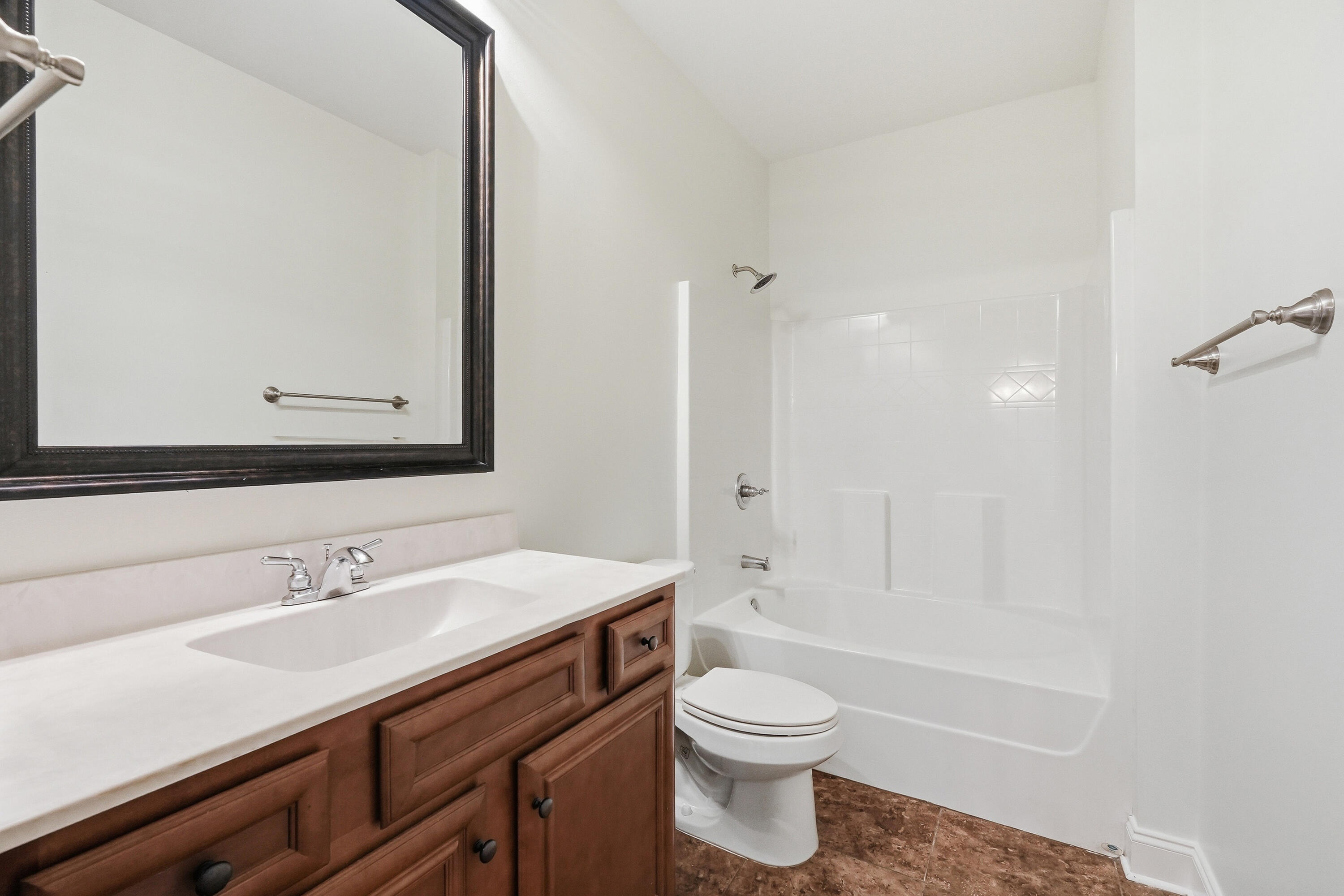 63 2nd Avenue Shalimar, FL 32579 - Photo 39 of 54 a bathroom with a sink a toilet and shower