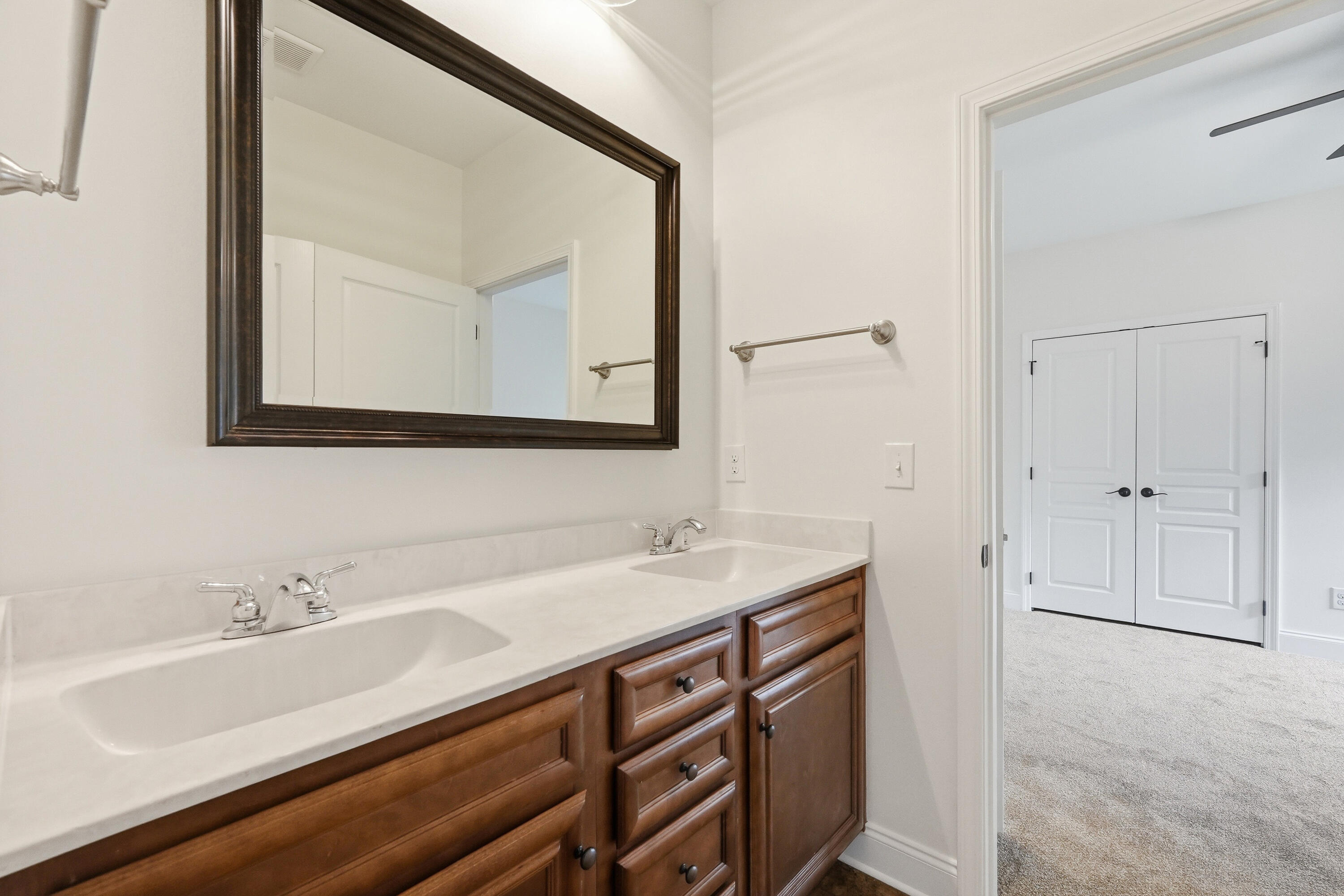 63 2nd Avenue Shalimar, FL 32579 - Photo 42 of 54 a bathroom with a sink and a mirror