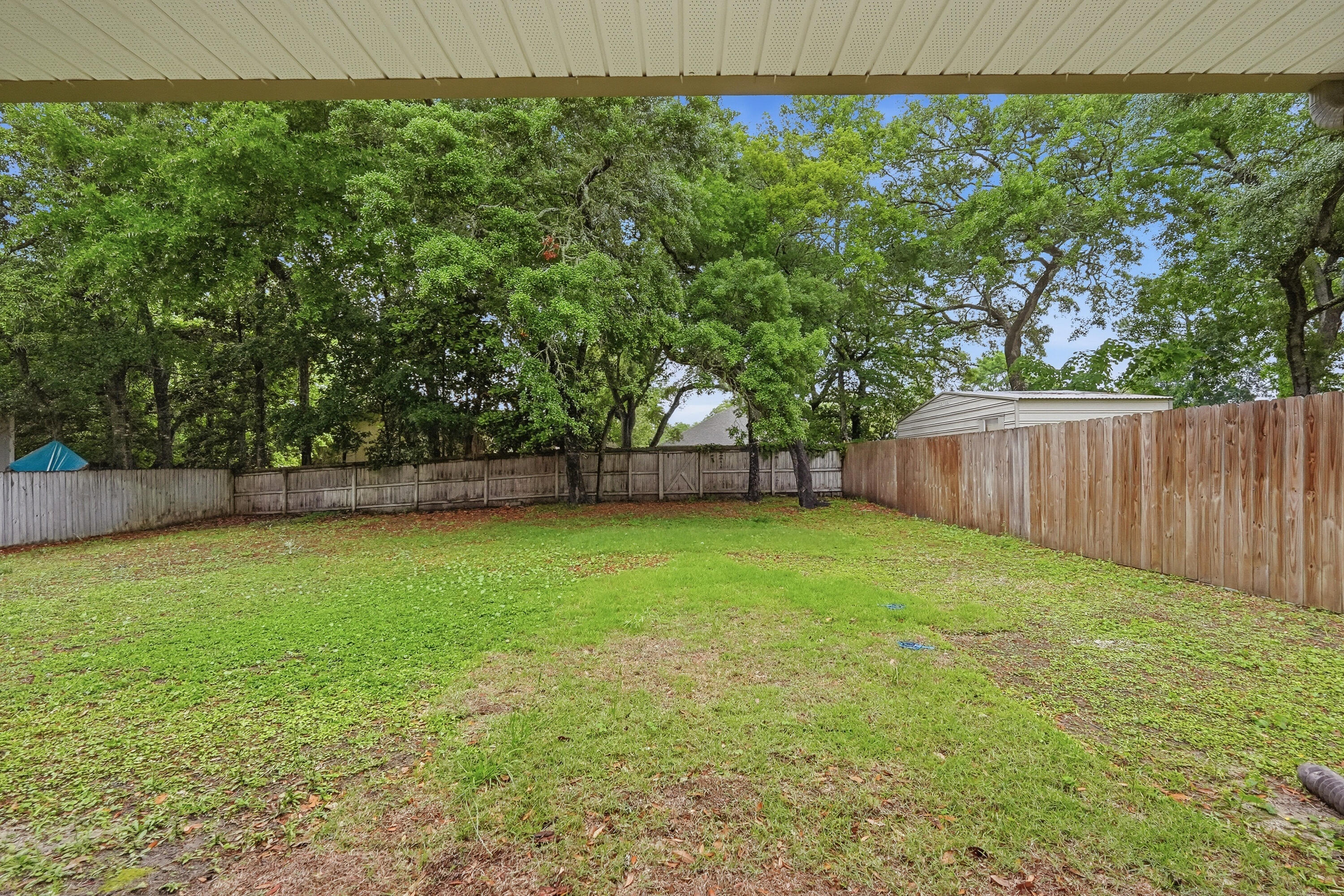 63 2nd Avenue Shalimar, FL 32579 - Photo 45 of 54 a view of a backyard with a trees