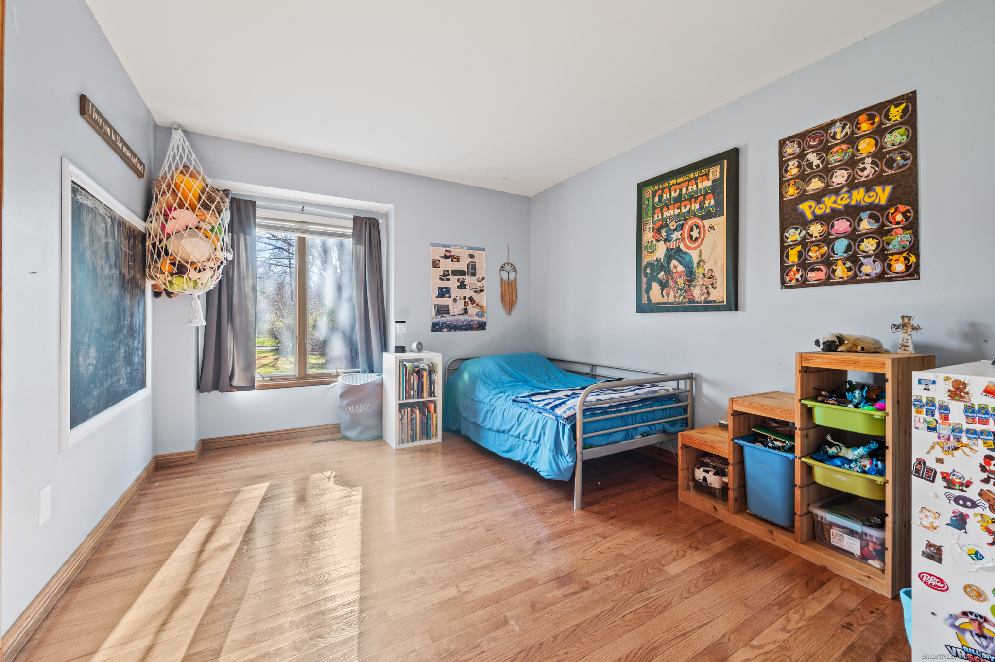 26 Farm View Drive Madison, CT 06443 - Photo 19 of 37 a bedroom with bed and a window