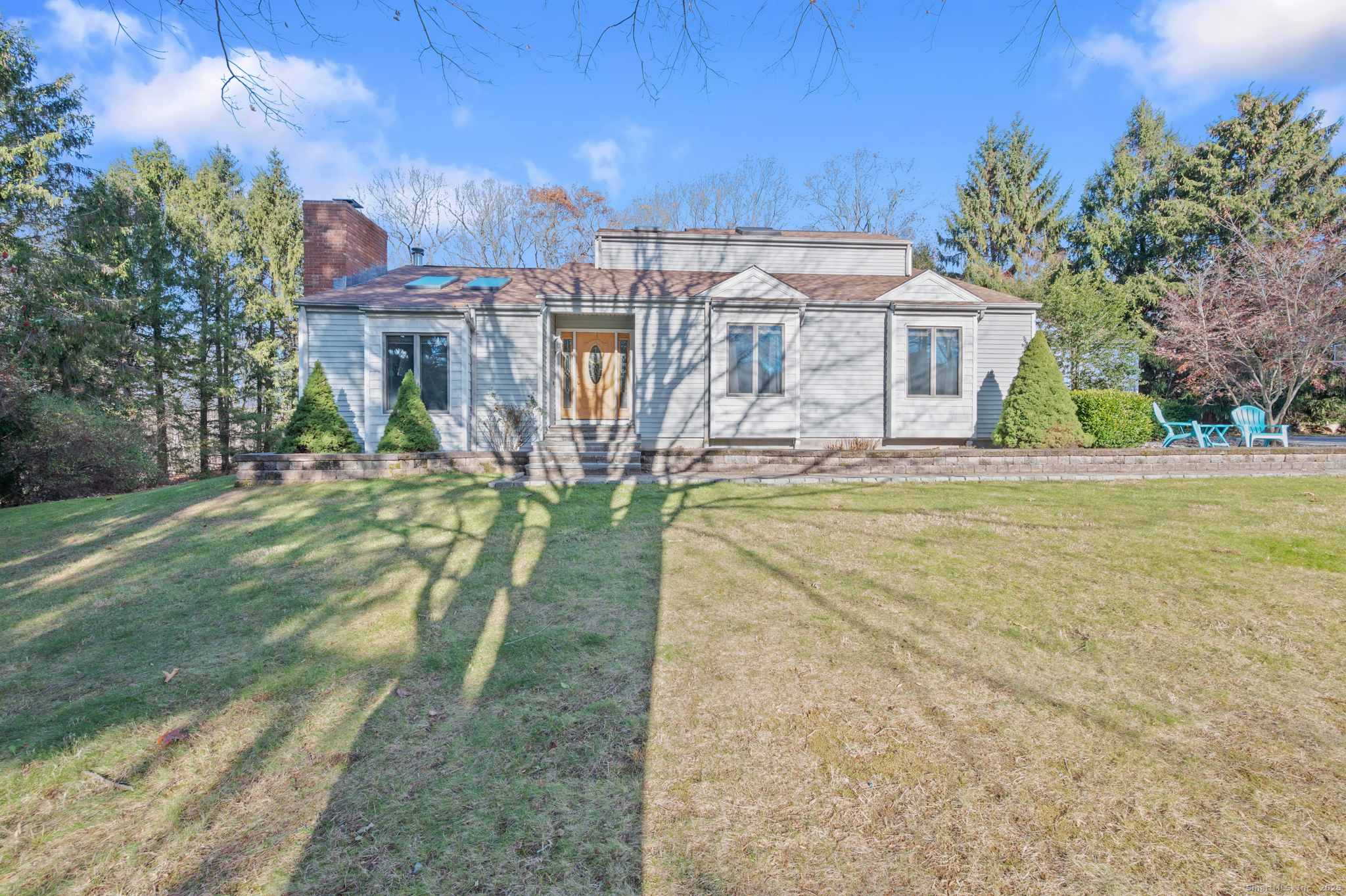 26 Farm View Drive Madison, CT 06443 - Photo 27 of 37 a view of a house with a yard