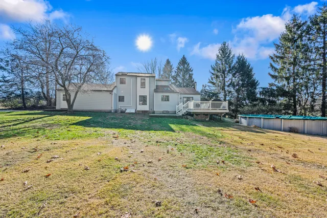 a bathroom with a sink and a yard