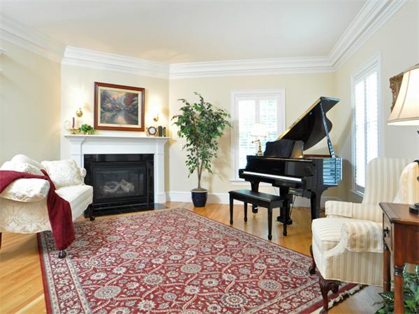 15 Hastings Road Weston, MA 02493 - Photo 1 of 21 a living room with furniture and a fireplace