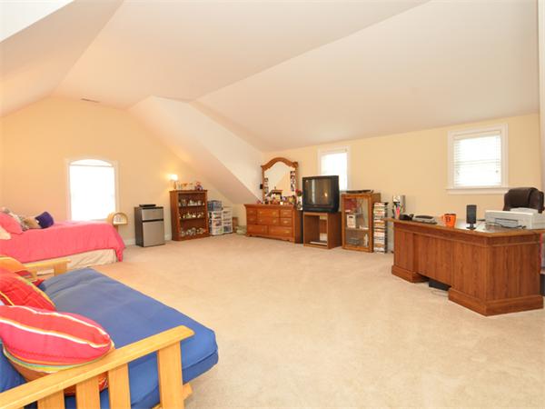 15 Hastings Road Weston, MA 02493 - Photo 15 of 21 a living room with furniture and a flat screen tv