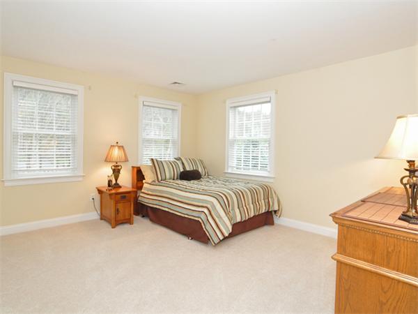 15 Hastings Road Weston, MA 02493 - Photo 18 of 21 a bedroom with bed and window
