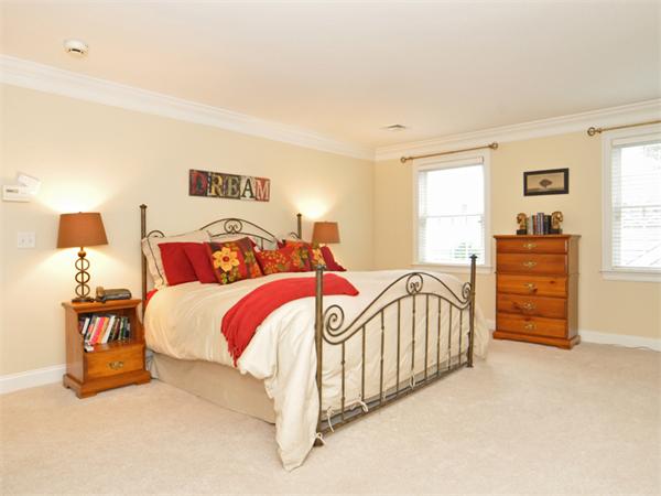 15 Hastings Road Weston, MA 02493 - Photo 19 of 21 a bedroom with a bed and a night stand