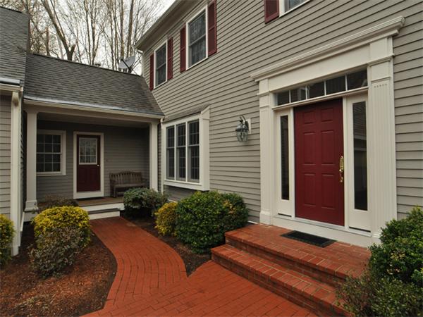15 Hastings Road Weston, MA 02493 - Photo 21 of 21 a front view of a house with garden