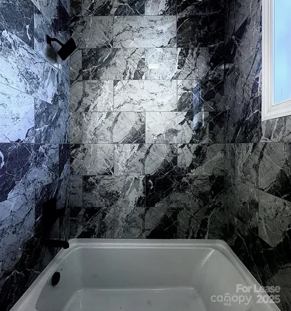 a bathroom with a bathtub