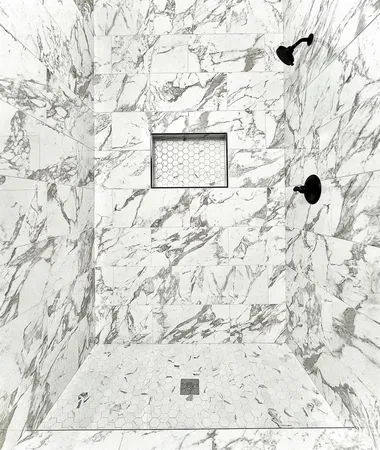 a view of a bath tub sitting in a bathroom