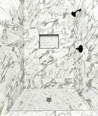 a view of a bath tub sitting in a bathroom