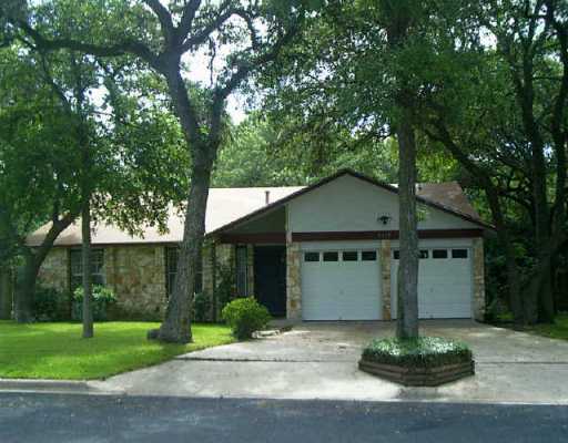 9217 Independence Loop Austin, TX 78748 - Photo 1 of 1 a front view of a house with a yard