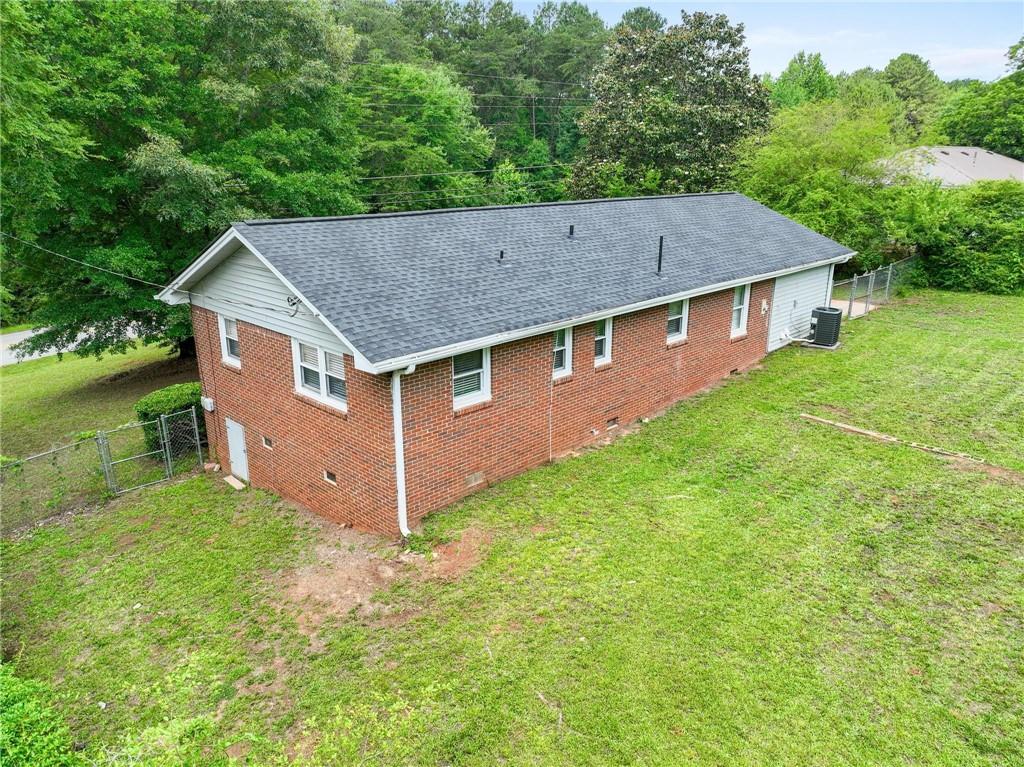 1745 Rockbridge Road Northwest Conyers, GA 30012 - Photo 31 of 32 an aerial view of a house