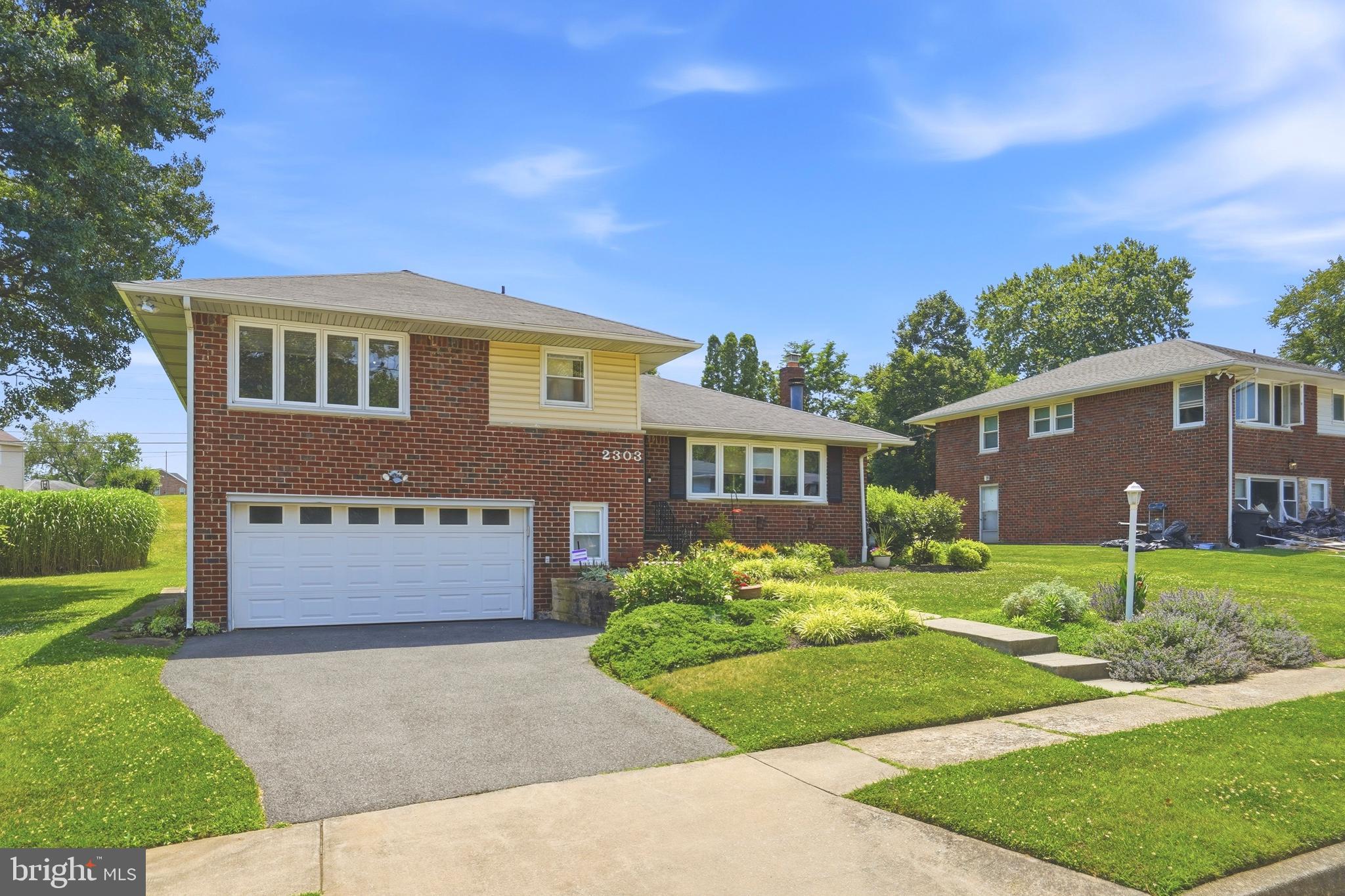 2303 Farringdon Road Baltimore, MD 21209 - Photo 2 of 36 Two car garage plus additional driveway parking