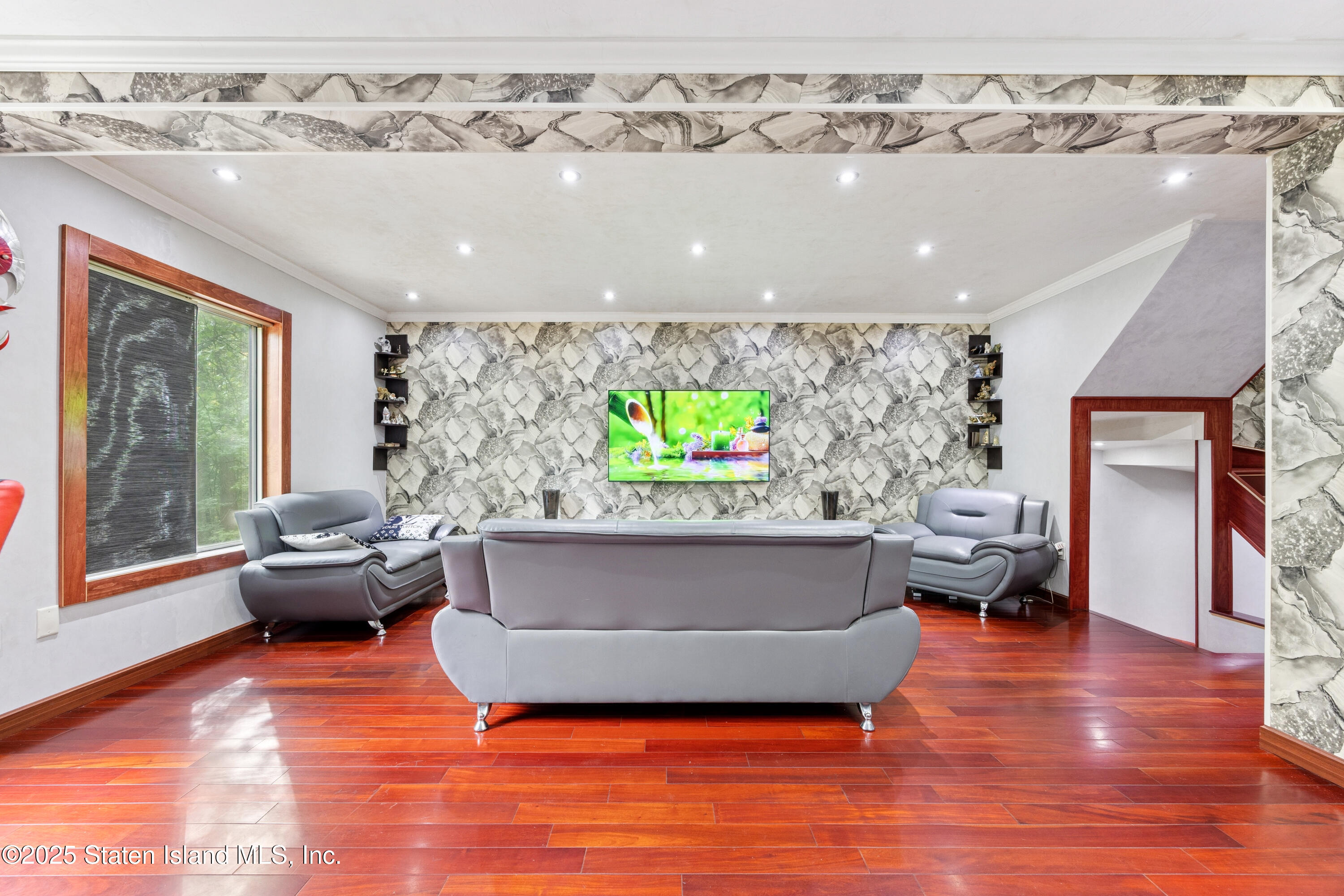 192 Ilyssa Way Staten Island, NY 10312 - Photo 2 of 25 a living room with furniture and a large window