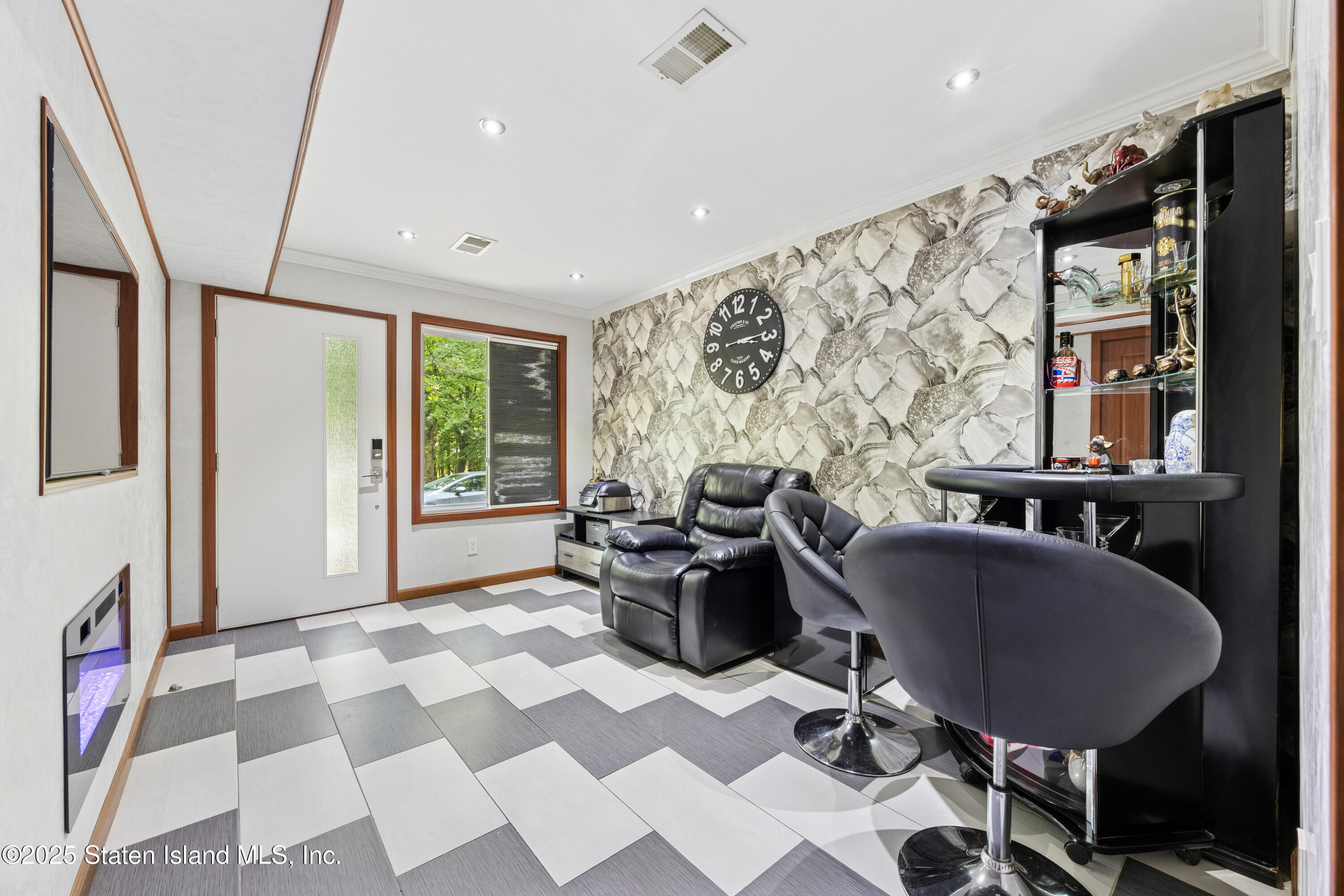 192 Ilyssa Way Staten Island, NY 10312 - Photo 21 of 25 a living room with a couch and a table