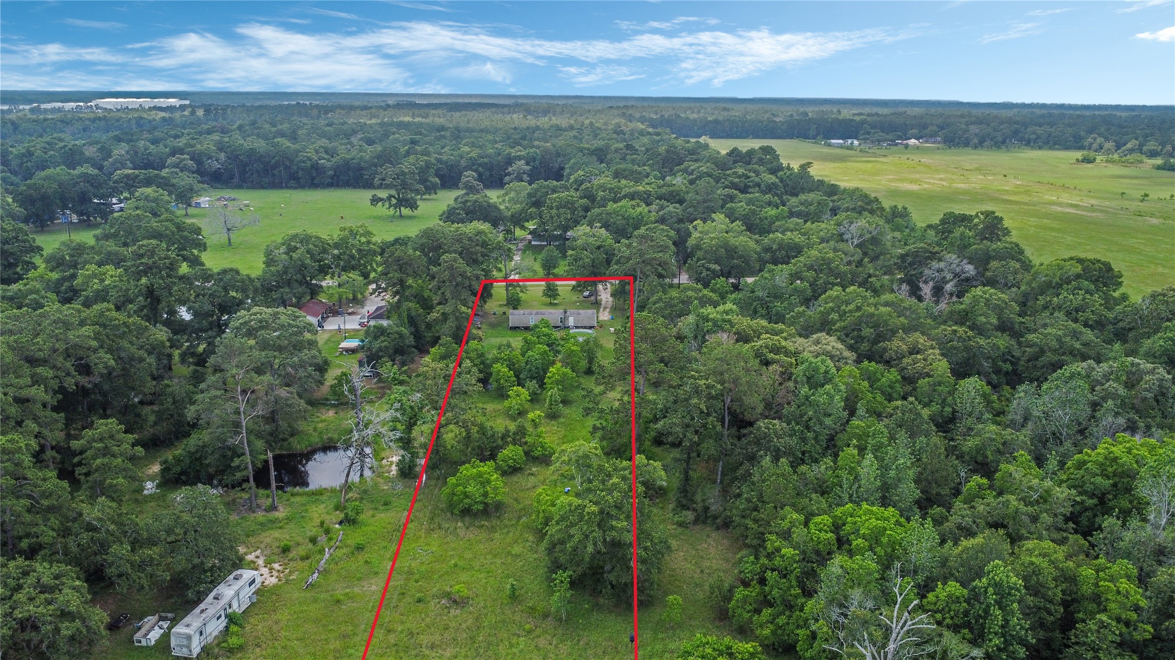 18093 Pickering Road Conroe, TX 77302 - Photo 4 of 29 an aerial view of a houses with outdoor space and river view