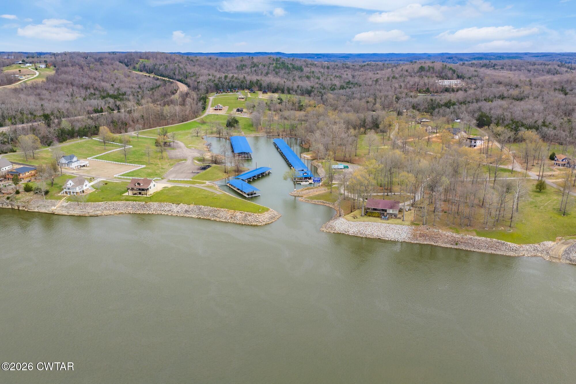 Lot 46 Adam Loop Bath Springs, TN 38311 - Photo 12 of 22 an aerial view of residential houses with outdoor space