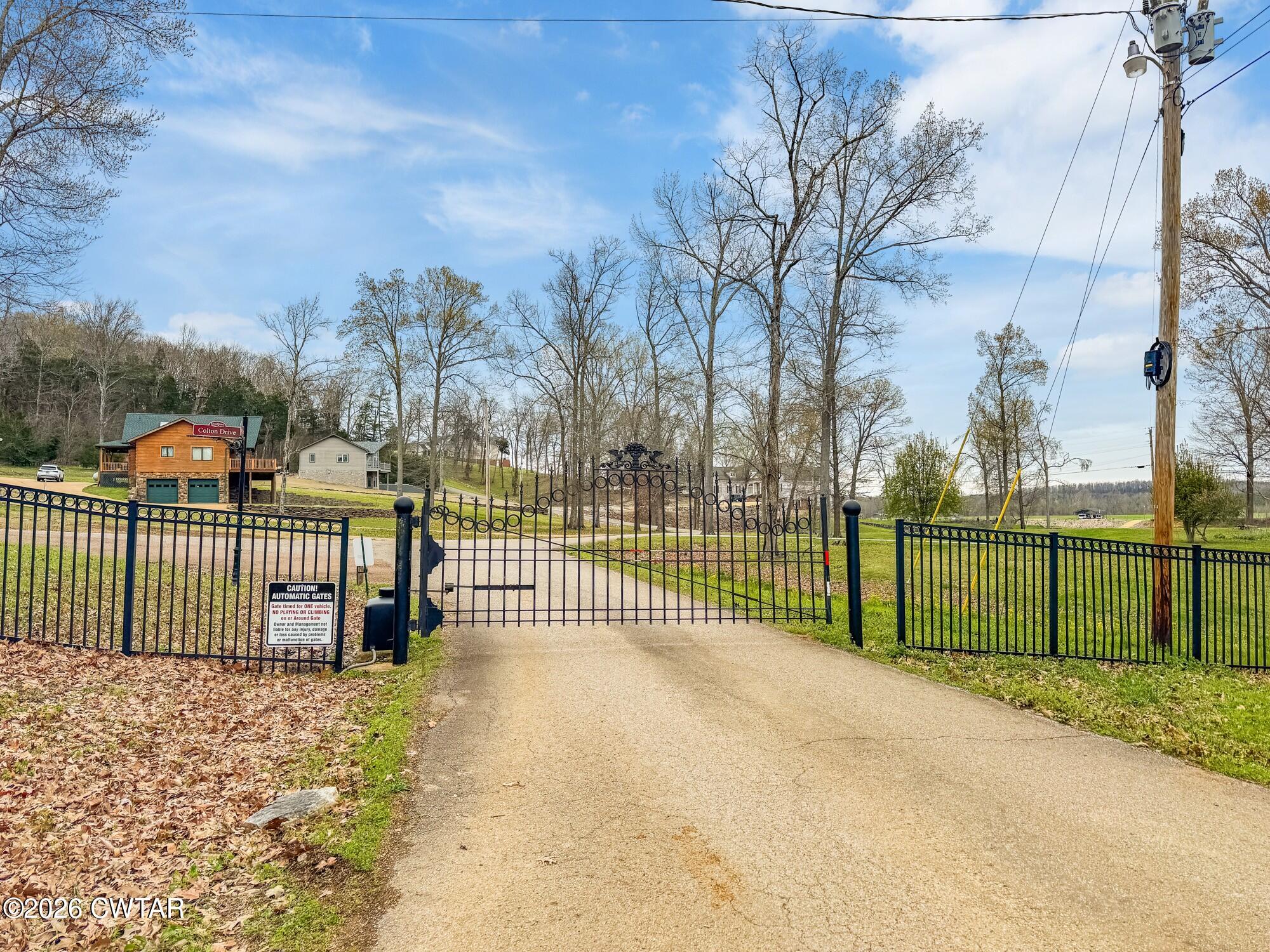 Lot 46 Adam Loop Bath Springs, TN 38311 - Photo 19 of 22 a view of a wrought iron fences in front of house