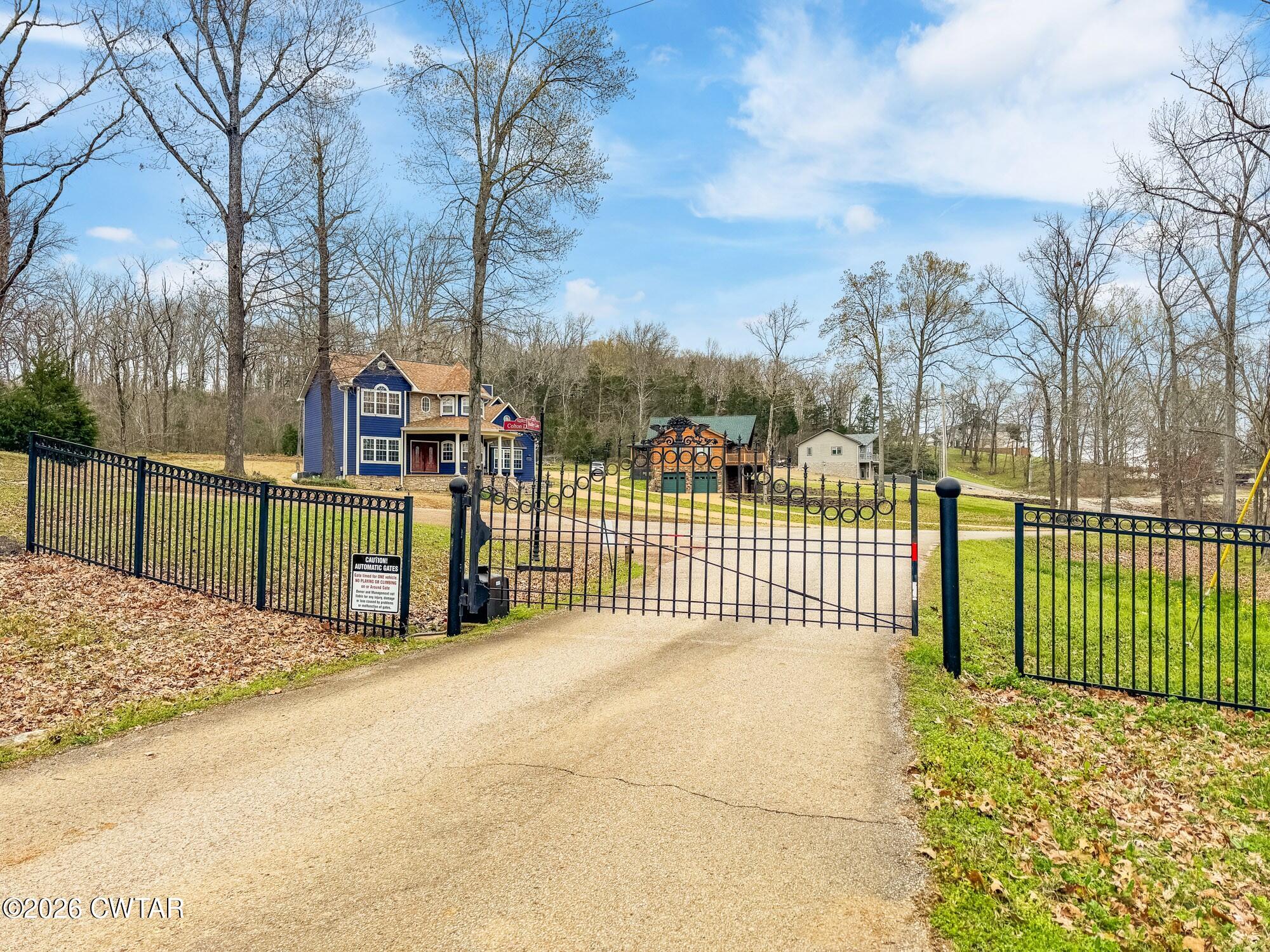 Lot 46 Adam Loop Bath Springs, TN 38311 - Photo 2 of 22 a view of a wrought iron fences in front of house
