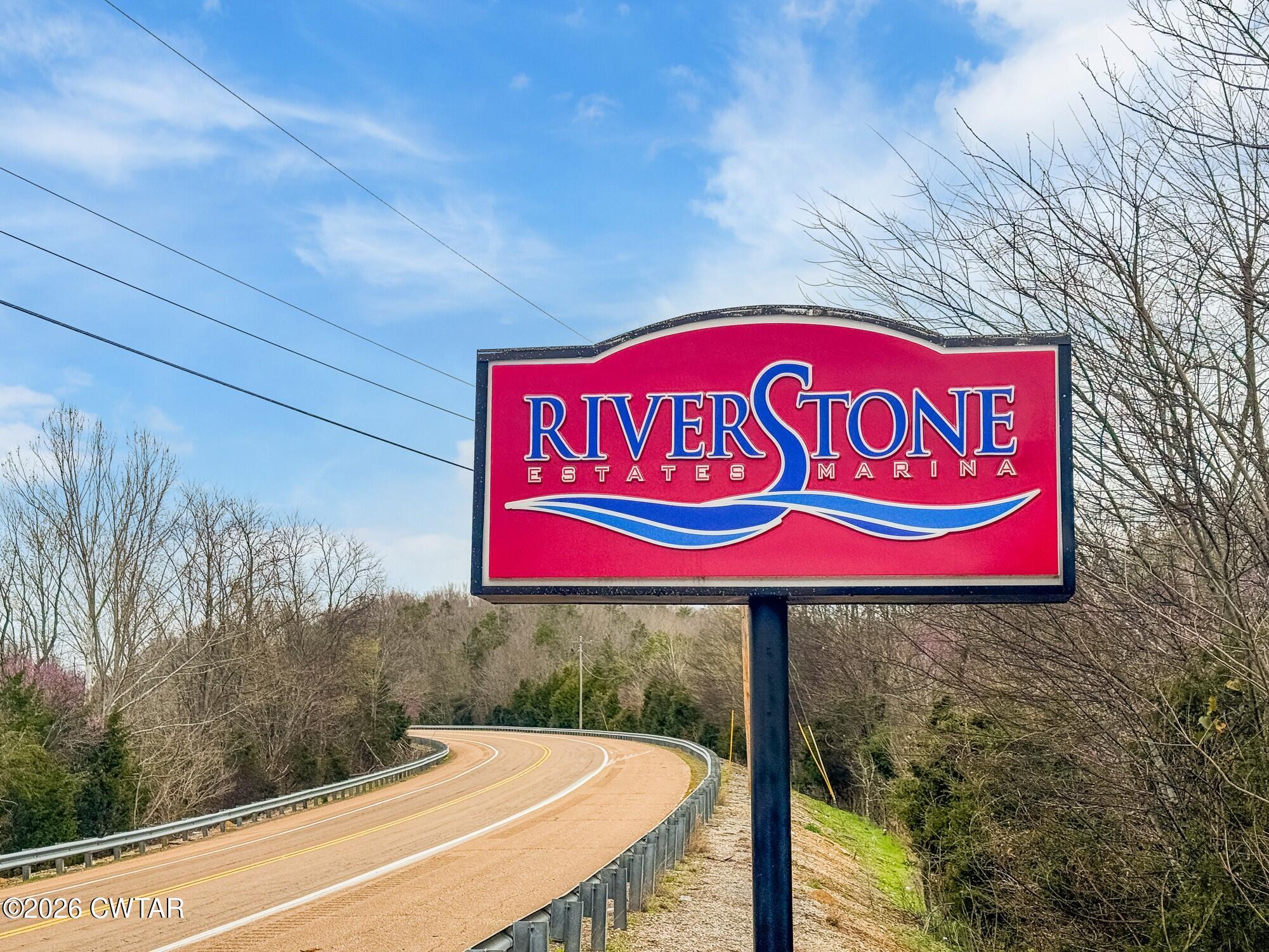 Lot 46 Adam Loop Bath Springs, TN 38311 - Photo 21 of 22 a sign that is on the side of a building