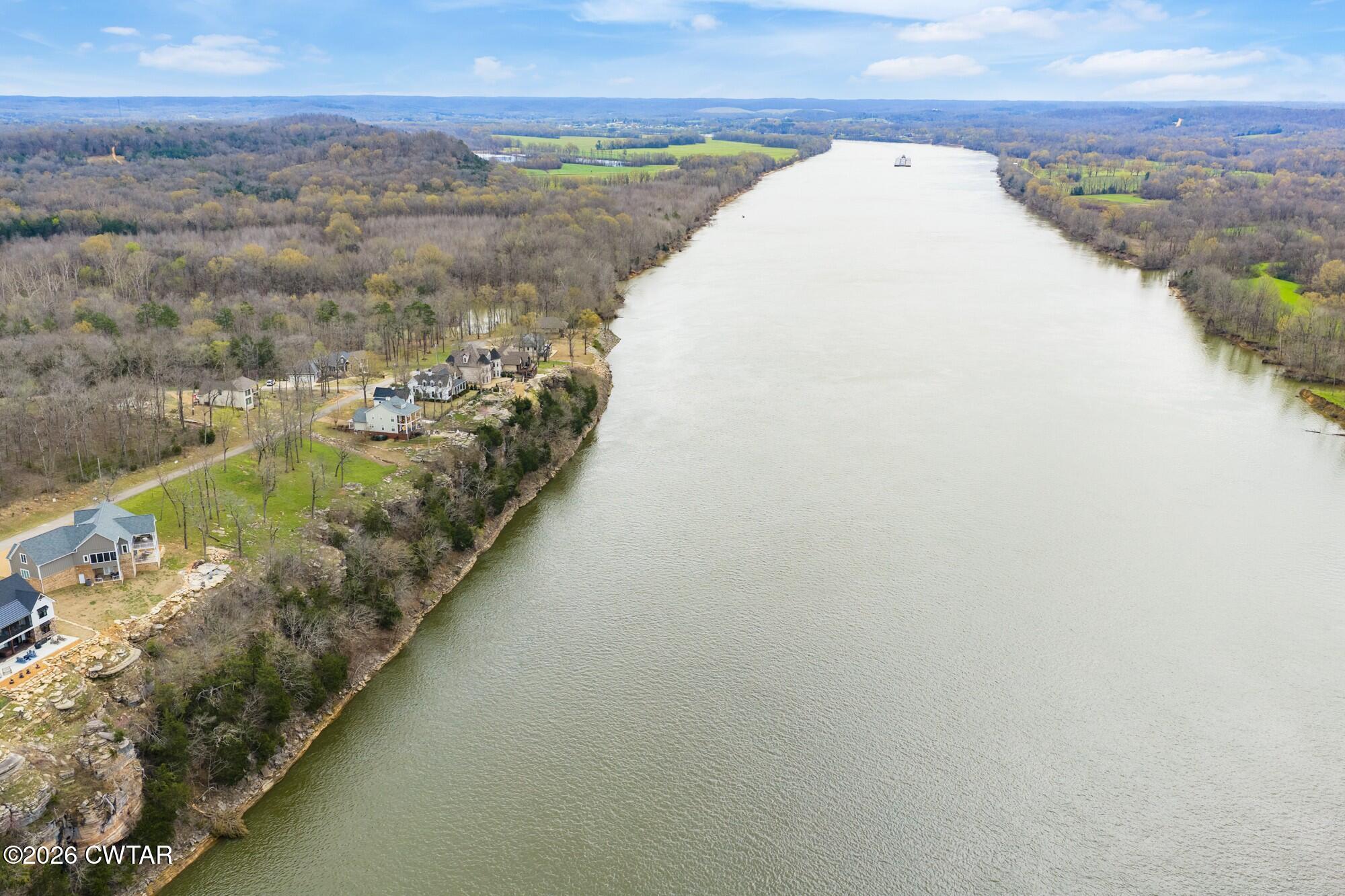 Lot 46 Adam Loop Bath Springs, TN 38311 - Photo 8 of 22 a view of a lake in middle of the town