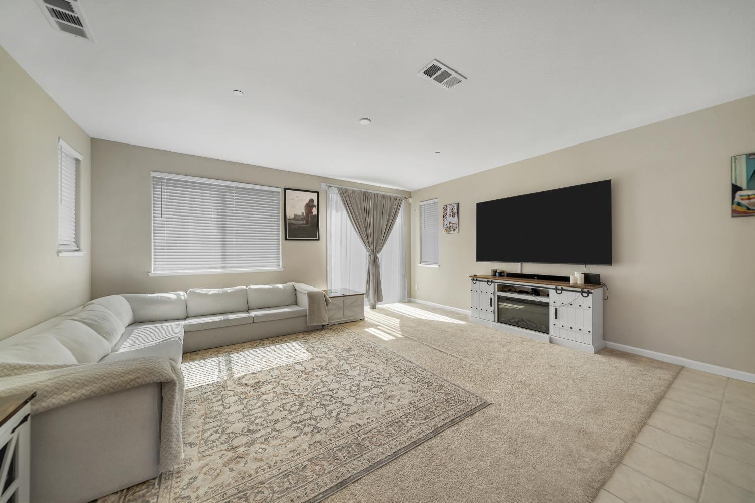 818 Stickney Way Oakley, CA 94561 - Photo 7 of 53 a living room with furniture and a flat screen tv