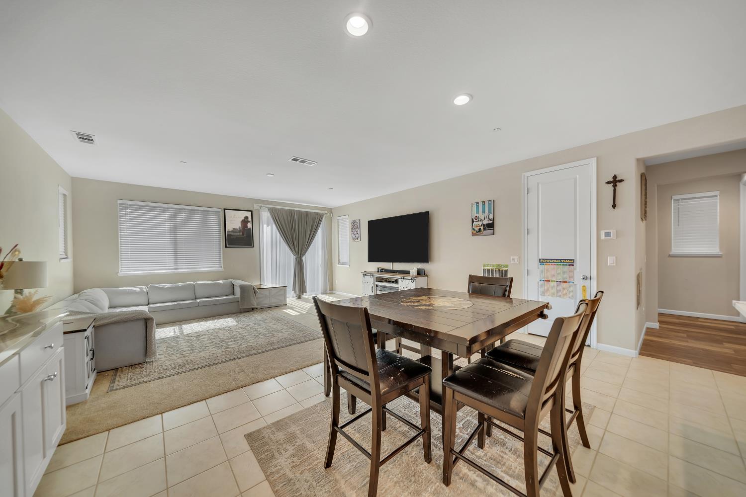 818 Stickney Way Oakley, CA 94561 - Photo 8 of 53 a view of a dining room with furniture and a flat screen tv