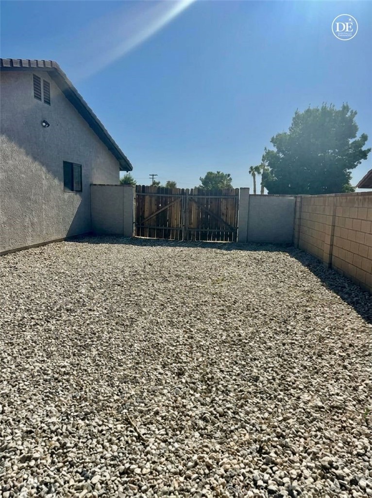 13375 Rincon Road Apple Valley, CA 92308 - Photo 39 of 72 RV parking / side of home w/ AI