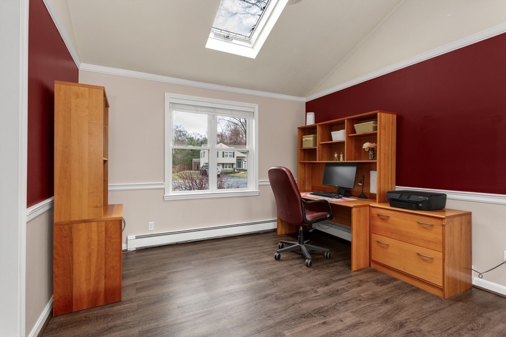 426 Coronation Drive Franklin, MA 02038 - Photo 19 of 46 a view of a workspace with furniture and a window