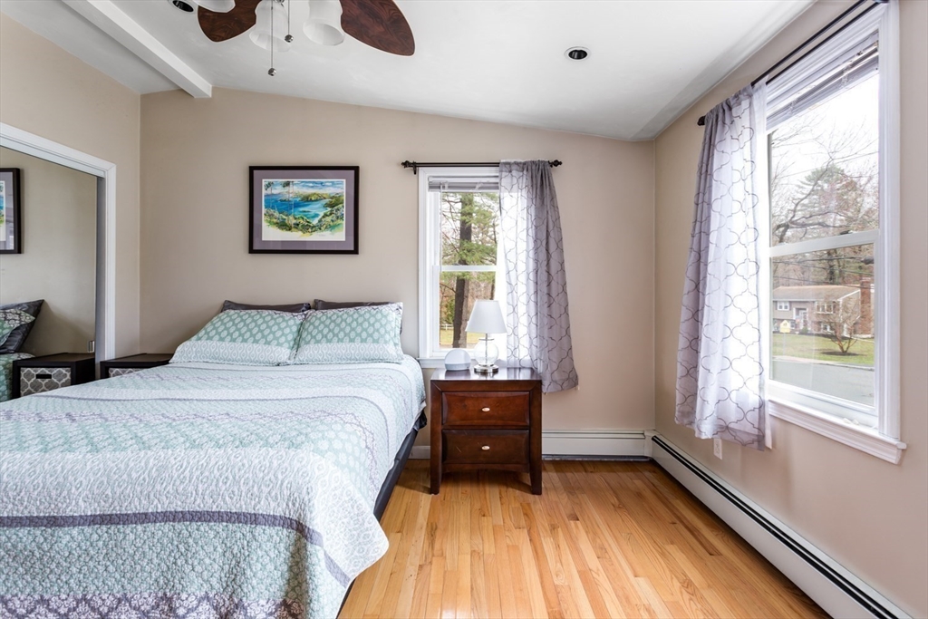 426 Coronation Drive Franklin, MA 02038 - Photo 26 of 46 a bedroom with a bed and a large window