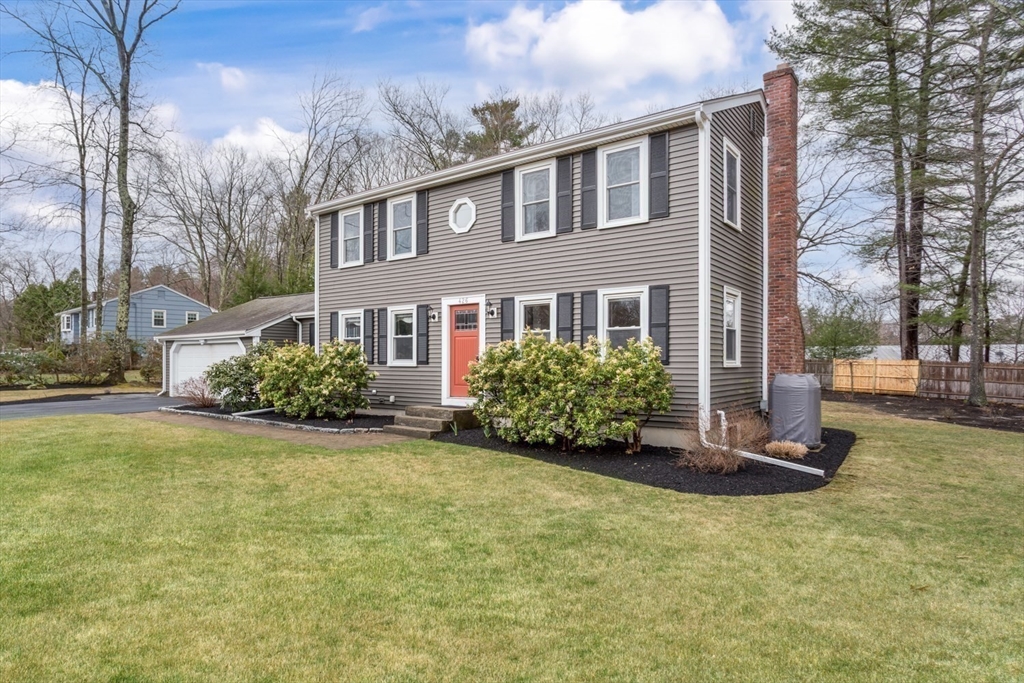 426 Coronation Drive Franklin, MA 02038 - Photo 37 of 46 a front view of a house with a yard