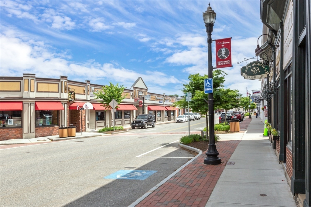 426 Coronation Drive Franklin, MA 02038 - Photo 40 of 46 a front view of a building with street view