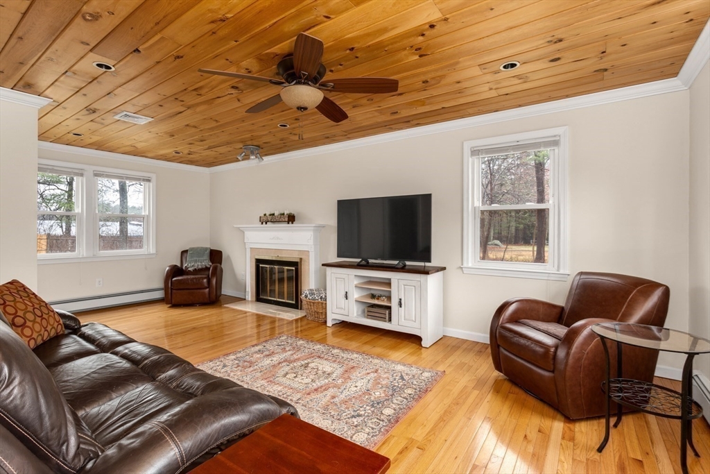 426 Coronation Drive Franklin, MA 02038 - Photo 4 of 46 a living room with furniture or fireplace and a flat screen tv