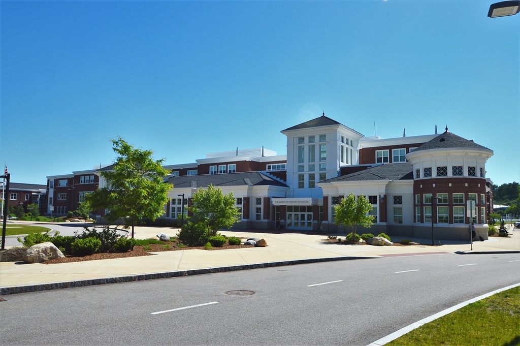 426 Coronation Drive Franklin, MA 02038 - Photo 42 of 46 a front view of a house with a yard