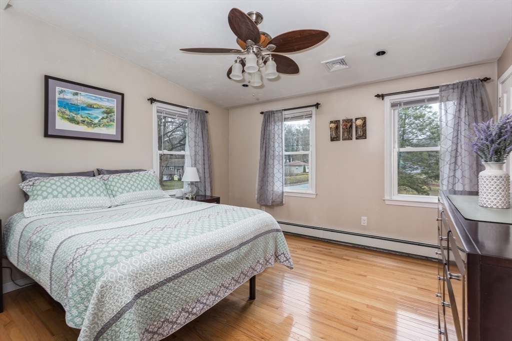 426 Coronation Drive Franklin, MA 02038 - Photo 5 of 46 a bedroom with a large bed and a window