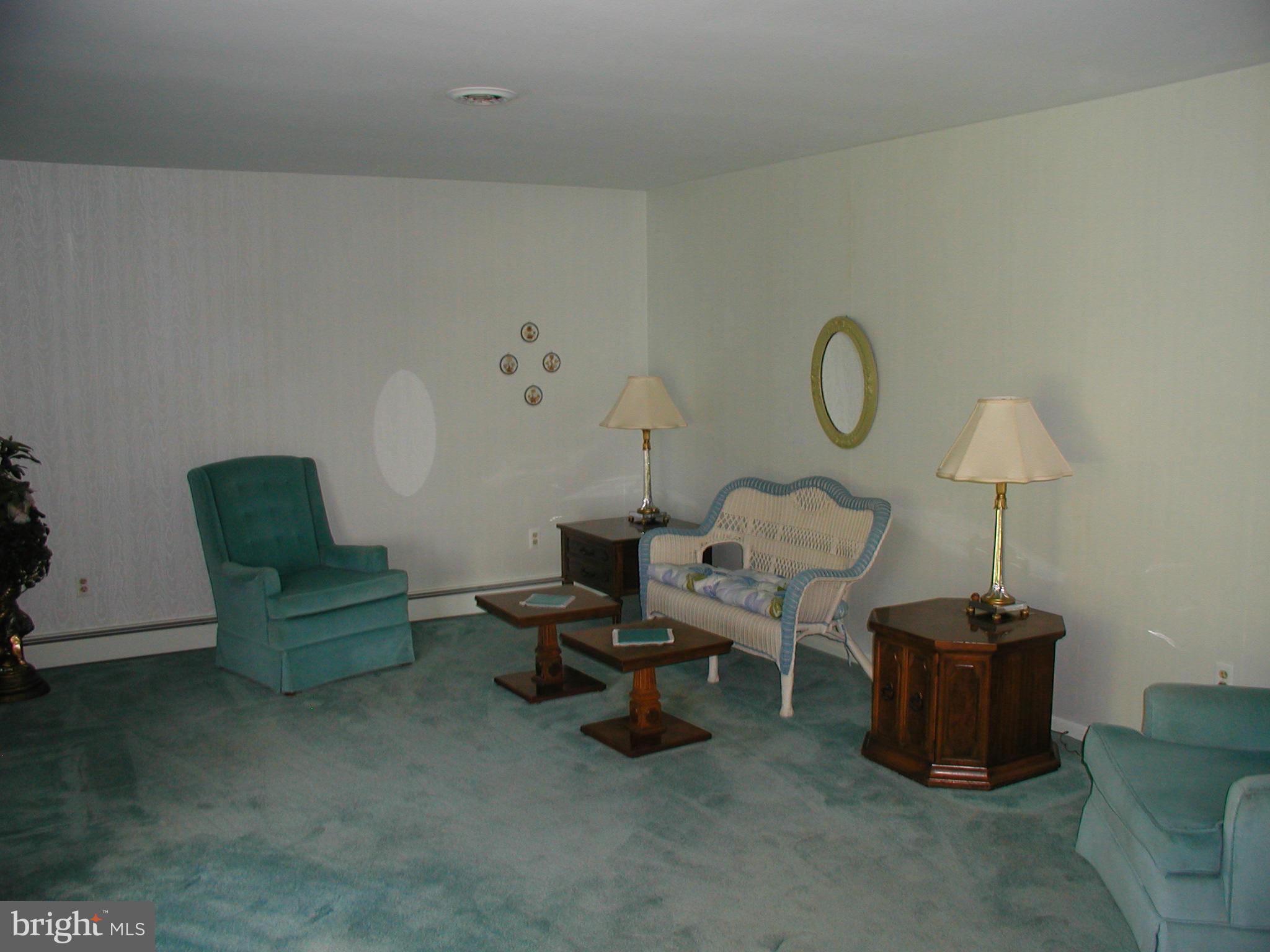 8834 Yellow Springs Road Frederick, MD 21702 - Photo 7 of 24 a living room with furniture and a table