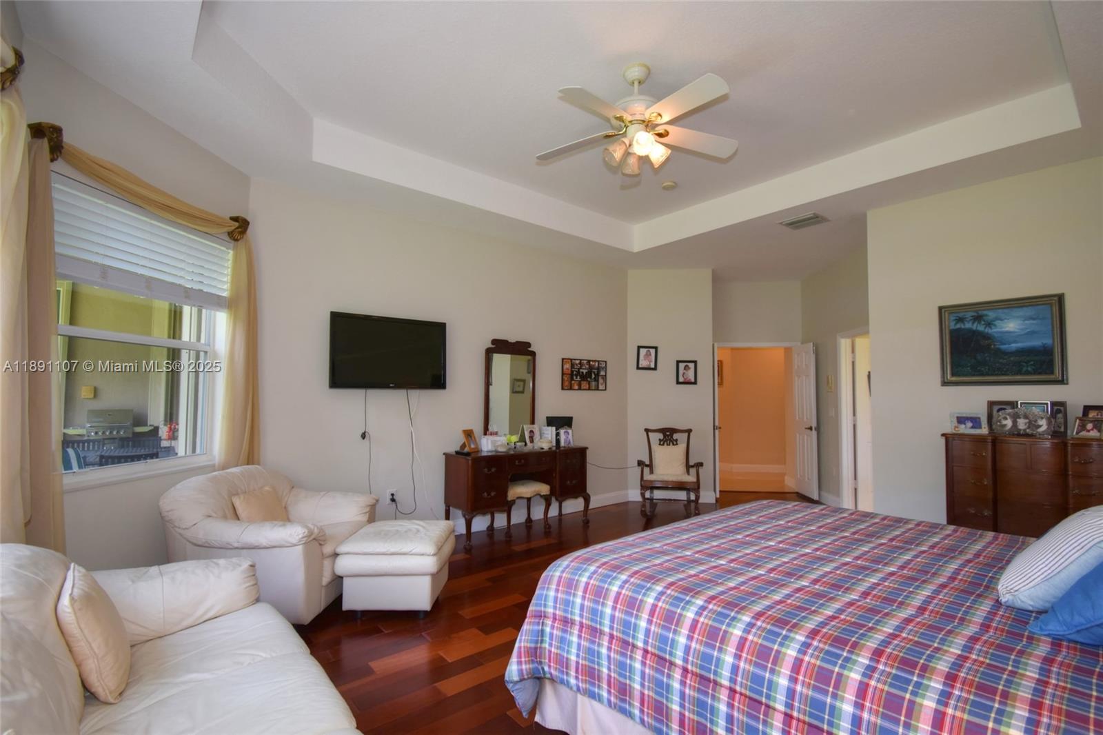 4240 Southwest 131st Avenue Davie, FL 33330 - Photo 21 of 47 a bedroom with a bed and a couch