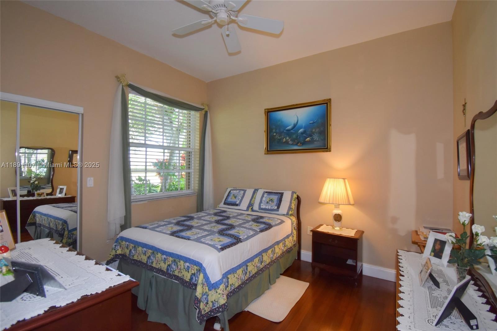 4240 Southwest 131st Avenue Davie, FL 33330 - Photo 27 of 47 a bedroom with a bed and wooden floor