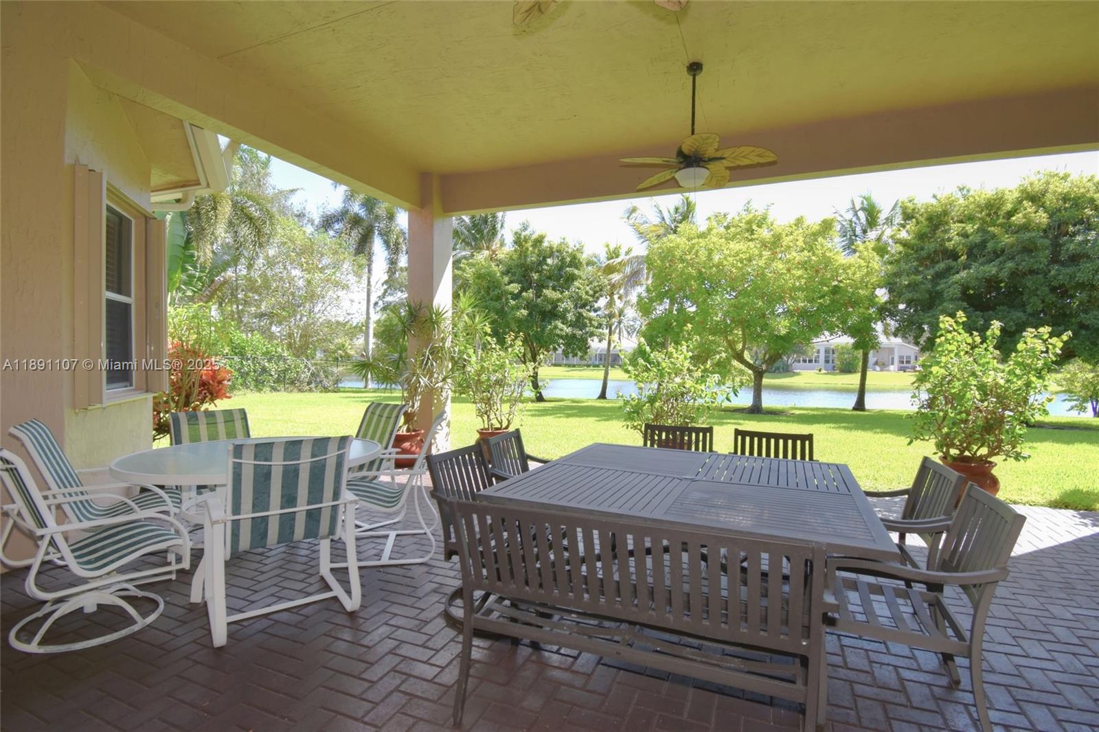 4240 Southwest 131st Avenue Davie, FL 33330 - Photo 34 of 47 a view of a dining room with furniture window and outside view