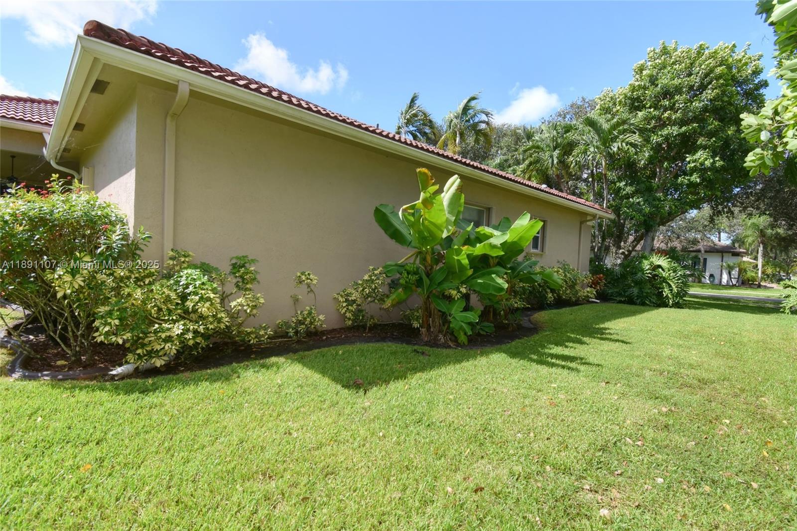4240 Southwest 131st Avenue Davie, FL 33330 - Photo 44 of 47 a backyard of a house with lots of green space